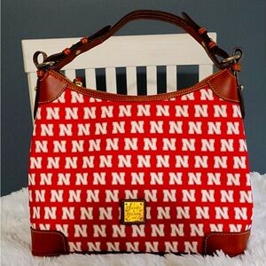 Dooney & Bourke NCAA Huskers Hobo-Style Purse.